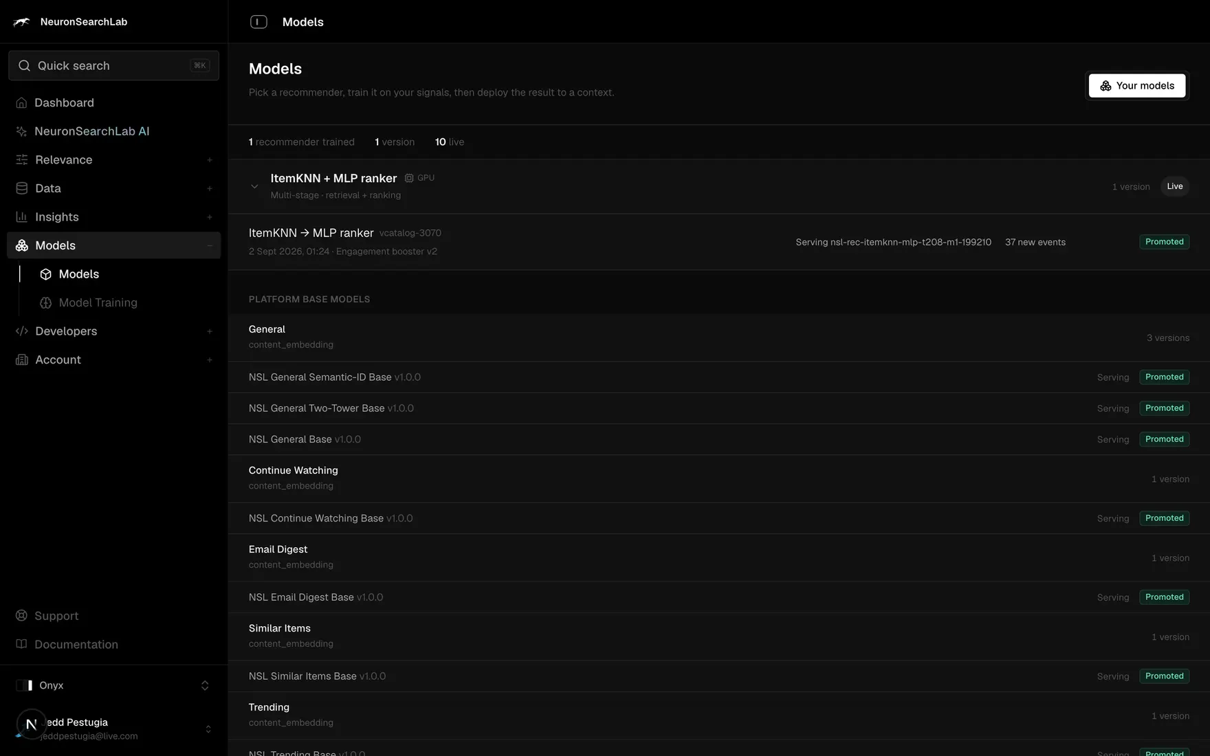 The console listing the recommenders trained on this account beside the platform base models, with the version of each that is serving.